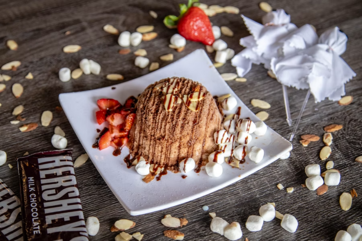 The Tuxedo at Vampire Penguin features chocolate shaved snow, sliced almonds, strawberries and chocolate sauce.